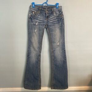 Low rise Amethyst embroidered jeans, tan and white seam, distressed.